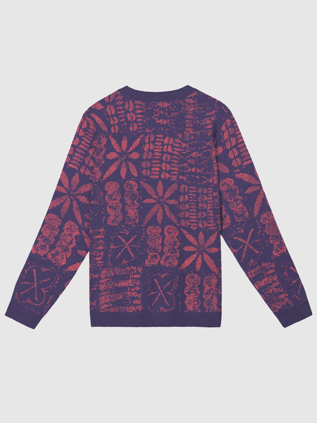 A long-sleeve crewneck sweater with an all-over yele arewa pattern in dark purple and red, shown flat against a light gray background.