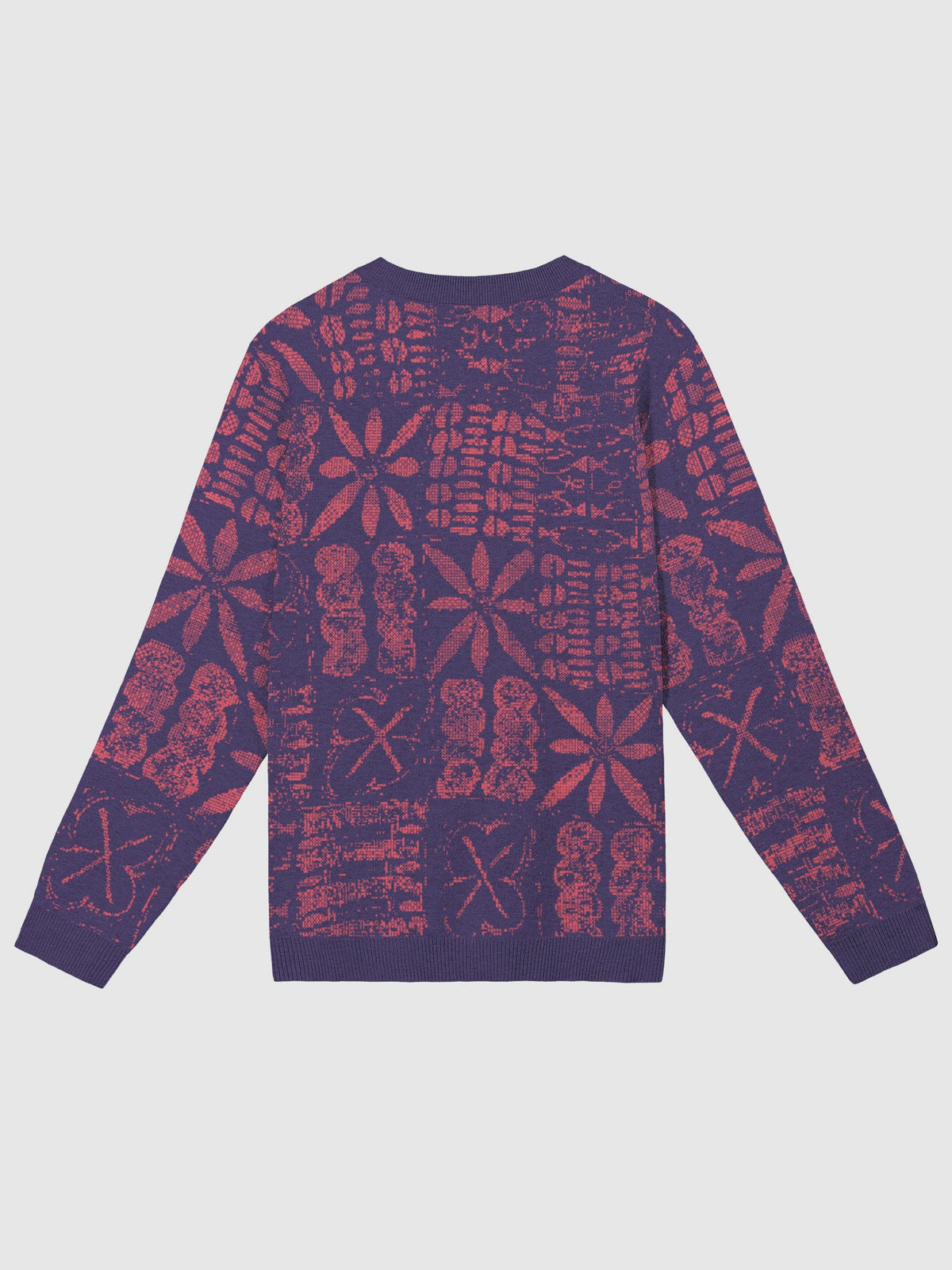 A long-sleeve crewneck sweater with an all-over yele arewa pattern in dark purple and red, shown flat against a light gray background.
