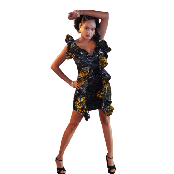 Model is wearing a dress made from a mix of Yelestitches Unity Ankara fabric and a sequin material.