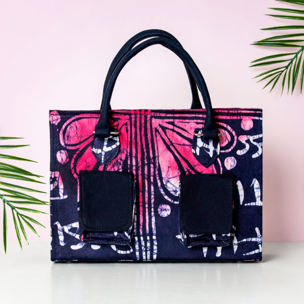 Stylish indigo and pink Adire fabric tote bag with short handle and camo front pockets
