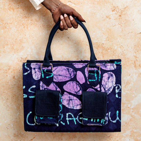 Stylish purple and pink Adire fabric tote bag with short handle and camo front pockets
