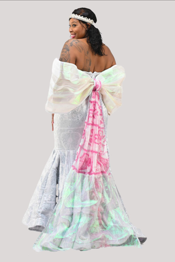 Bride in Afro-futuristic wedding gown with Adire sequin and organza detailing, celebrating African heritage, back of dress