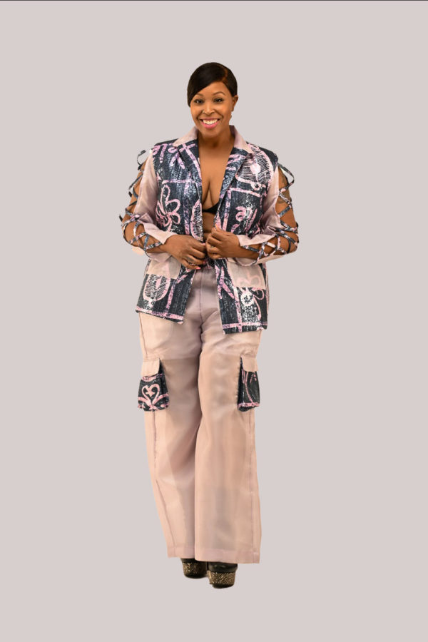Chic navy blue Adire brocade pant suit with lavender organza detailing, symbolizing cultural strength and love