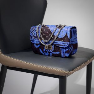 Yelé Print Embellished Maxi Bag in striking Blue and Black featuring the structured silhouette and Silver chain strap.