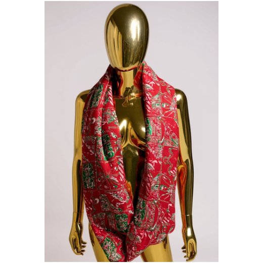Yele Festivity Print Winter Scarf styled on gold mannequin showing full drape and color details.